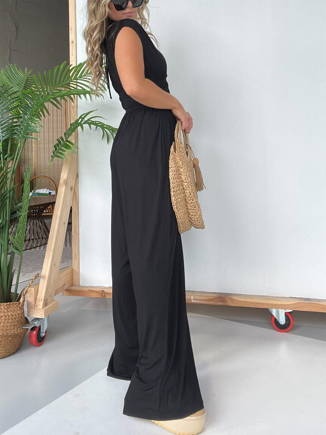 Eaksone - V-Neck Jumpsuit with Adjustable Back Knot