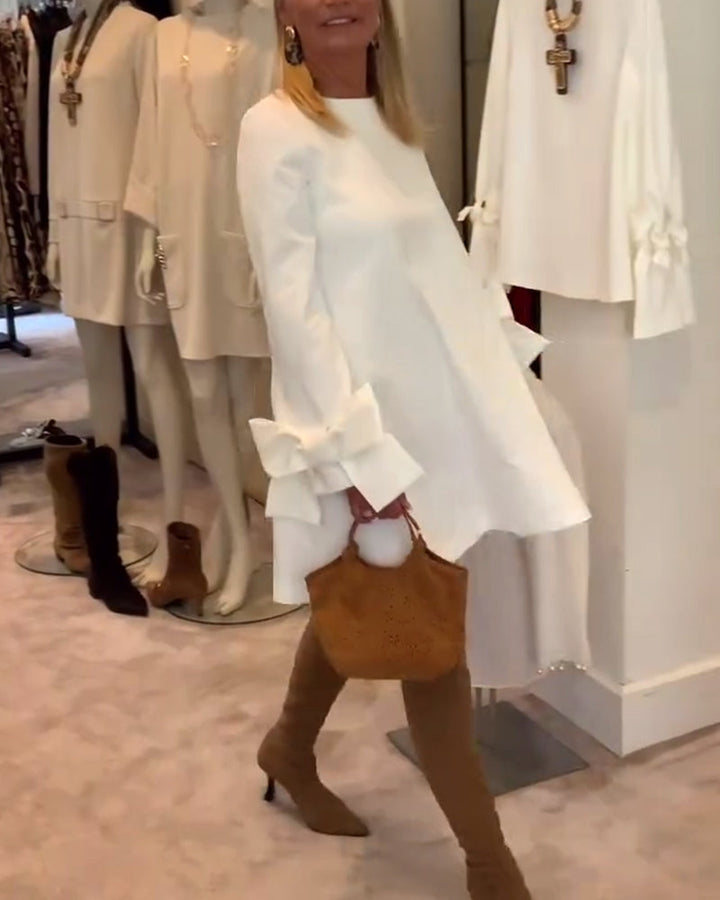 NIA – ELEGANT BOW-SLEEVE MINI DRESS